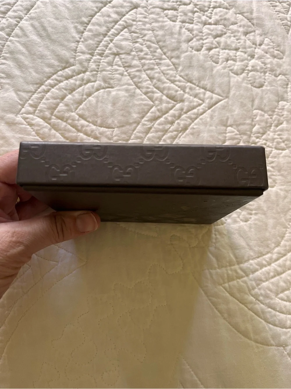 Gucci embossed pattern